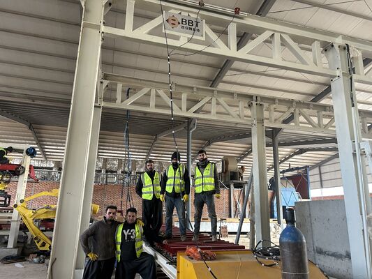 Πλήρως αυτόματο σύστημα εκφόρτωσης και συσκευασίας τούβλων χωρίς παλέτες για γραμμές παραγωγής πήλινων τούβλων